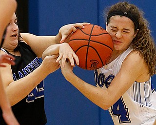 POLAND, OHIO - DECEMBER 6, 2017: Poland's Gabby Romano (1) steals the ball from Lakeview's Laura Garvin (32) during the 3rd qtr. at Poland High School.  MICHAEL G. TAYLOR | THE VINDICATOR