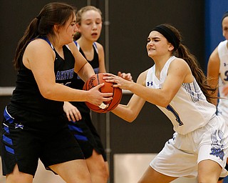 POLAND, OHIO - DECEMBER 6, 2017: Poland's Brooke Bobbey (1) steals the ball from Lakeview's Laura Garvin (32) during the 3rd qtr. at Poland High School. MICHAEL G. TAYLOR | THE VINDICATOR