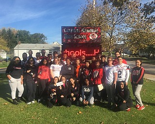 Campbell Memorial High School seniors, above, pledged to Plant the Promise of maintaining a healthy and drug-free life during Red Ribbon Week in October. Red tulip bulbs were planted around the school’s main entrance as a pledge by 30 seniors to serve as a reminder to all students about the importance of a drug-free life. The campaign is part of the National Plant the Promise Campaign.
