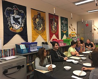 The pages of J. K. Rowlings’ “Harry Potter” series came to life during the monthly sixth-grade Harry Potter Book Club meetings at Struthers Middle School. The first meeting was Oct. 17 with 50 students in attendance. They discussed the first book and J.K. Rowlings’ inspiration behind the Sorting Hat and crafted their own wands while watching “Harry Potter and the Sorcerer’s Stone.” Students also have signed up for Pottermore, an interactive website that explores the in-depth Wizarding World of Harry Potter, where they were “sorted” into their Hogwarts Houses. The book club was started by teachers Jennifer Pint, Erica Loew and Elizabeth Kelly and will meet monthly throughout the school year. Above, students in the club work on crafting wands.