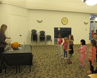 Neighbors | Zack Shively.Ashley Young did a demonstration at the Goosebimps Party where she poured vinegar into a jack-o-lantern with baking soda inside of it. The reaction resulted in the pumpkin looking like it was vomitting blue foam.