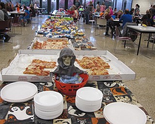 Neighbors | Zack Shively.The Pumpkin Promenade at Boardman High School included pizza, chips and drinks for the school staff and their families.