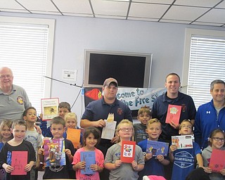 Neighbors | Zack Shively.Poland Union students brought over cards to the fire department to thank them for their service. They had more than 200 cards delivered. Pictured are, from left, (front) Conner Henderson, Christian Steed, Addyson Halt, Guilanna Falasca, Oliver Simerlink, Demetri Kindinis, Kiaya Webb; (middle) Allie Nigh, Micah Walker, Pete Zoumis, Makenna Saville, Aston Sattarelli; (back) Fire Prevention Officer Bill O'Hara, volunteer Jake Ezzo, volunteer Ian Harker and principal Michael Masucci.