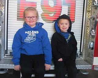 Neighbors | Zack Shively.The Union students got to tour the fire department and explore the fire trucks after they ate. The students met with their families and learned about the fire trucks and fire equipment.