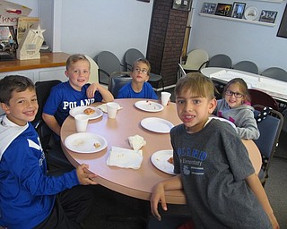 Neighbors | Zack Shively.Poland Union students enjoy pizza and drinks from Cocca's Pizza at the Village Fire Department. The students spoke with firefighters during their meal. Pictured are, clockwise from left, Micah Walker, Oliver Simerlink, Demetri Kindinis, Aston Satterelli and Kiaya Webb.