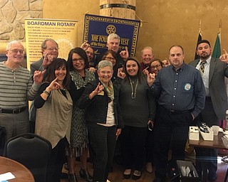 Neighbors | Submitted .The Boardman Rotary Club drew a purple “X” on their pinkies for Polio awareness. The club wishes to eradticate polio completely.