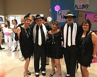 Neighbors | Submitted.Canfield Local Schools administrators and staff celebrated Halloween in style with a Roaring 20s theme. Pictured are, from left, Chris Hagman, John Tullio, Janice Kabesto, Alex Geordan and Patti Kessner.