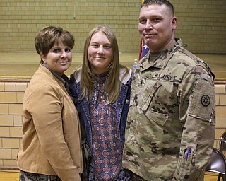 Neighbors | Abby Slanker.Chief Warrant Officer 3 Russell Conwell Haddon III of the United States Army served as the guest speaker at the Canfield Village School’s annual Veterans Day Program on Nov. 10. He was joined by his wife, Colleen, and daughter, Briana, a CVMS eighth-grade student.