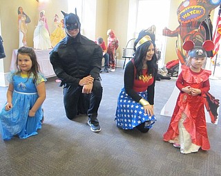 Neighbors | Zack Shively.The Public Library of Youngstown and Mahoning County invited volunteers to dress up as superheroes for their Disney Princess and Superhero Breakfast at the Poland library. Pictured are Audrey Kent and Ashlee McGee with superhero volunteers.