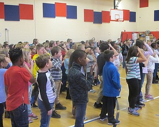 Neighbors | Zack Shively.The celebration ceremony praises students for their accomplishments in fun and novel ways. Pictured, the students kiss their brains at the celebration.