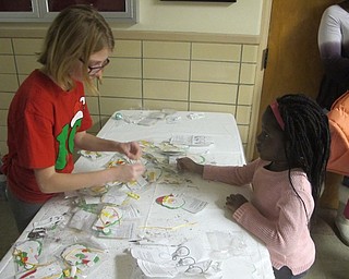 Neighbors | Zack Shively.Families came to the school for breakfast, crafts and pictures with Santa for the Breakfast with Santa event. The school hosts the event on the first Saturday in December.