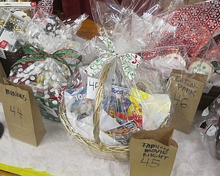 Neighbors | Zack Shively.The parents bought raffle tickets at the Breakfast with Santa. The raffle helped the PTA raise funds for their organization and school. They had 53 baskets with various different prizes in each.