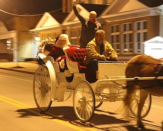 Neighbors | Abby Slanker.Santa Claus arrived in style to the Rotary Club of Canfield’s annual Lighting of the Green in a horse-drawn sleigh on Dec. 1.