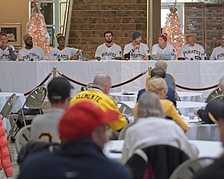 YOUNGSTOWN, OHIO - DECEMBER 7, 2017: Pittsburgh Pirates pitcher Chad Kuhl, center, answers questions from Pirates fans while seated net to his teammates, Thursday morning at the Butler Institute of Art during the Pirates Care-A-Van tour. DAVID DERMER | THE VINDICATOR