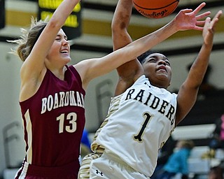 WARREN, OHIO - DECEMBER 7, 2017: Harding's XXX, right, and Boardman's Cate Green reach for a rebound during the first half of their game, Thursday night at Warren Harding High School. DAVID DERMER | THE VINDICATOR..No #1 on Harding roster.