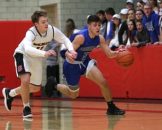 Hubbard's Cam Resatar (3) charges towards the net after stealing the ball from Struthers' Trey Metzka (11) in the second quarter of an AAC high school basketball game, Friday, Dec. 8, 2017, in Struthers. Hubbard won 70-55...(Nikos Frazier | The Vindicator)