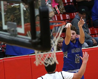 Hubbard's Shannon Slovesko (12) goes up for three in the third quarter of an AAC high school basketball game against Struthers, Friday, Dec. 8, 2017, in Struthers. Hubbard won 70-55...(Nikos Frazier | The Vindicator)