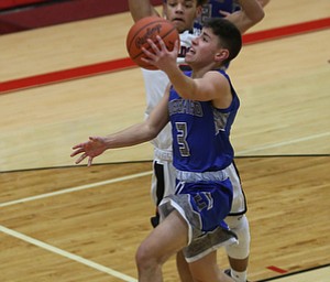 Hubbard's Cam Resatar (3) goes up for a layup in the third quarter of an AAC high school basketball game against Struthers, Friday, Dec. 8, 2017, in Struthers. Hubbard won 70-55...(Nikos Frazier | The Vindicator)