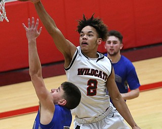 Hubbard's Cam Resatar (3)'s shot is blocked by Struthers' Tyrese Hawkins (2) in the third quarter of an AAC high school basketball game, Friday, Dec. 8, 2017, in Struthers. Hubbard won 70-55...(Nikos Frazier | The Vindicator)