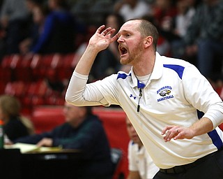 Hubbard head coach Justin Townsend calls out a play in the fourth quarter of an AAC high school basketball game against TEAM, Friday, Dec. 8, 2017, in Struthers. Hubbard won 70-55...(Nikos Frazier | The Vindicator)