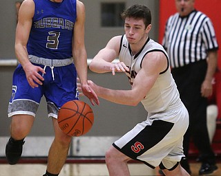 Hubbard's Cam Resatar (3) steals the ball from Struthers' Ryan Leonard (20) in the fourth quarter of an AAC high school basketball game against TEAM, Friday, Dec. 8, 2017, in Struthers. Hubbard won 70-55...(Nikos Frazier | The Vindicator)