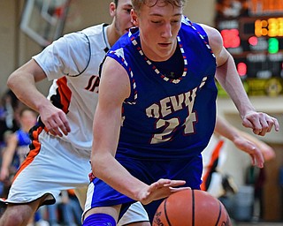 NEW MIDDLETOWN, OHIO - DECEMBER 8, 2017: Western Reserve's Kade Hilles secures the ball from a Springfield defender during the 2nd half of their game, Friday night at Springfield High School. DAVID DERMER | THE VINDICATOR