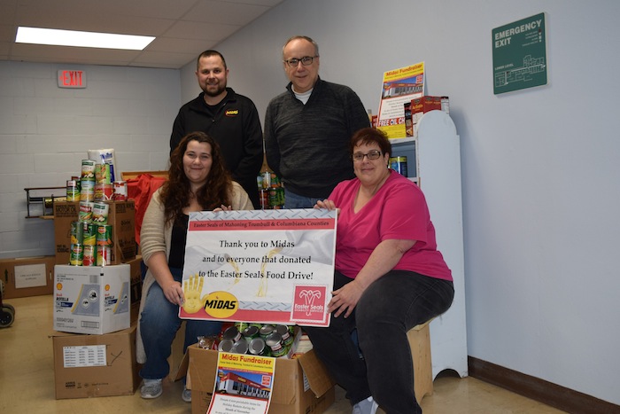 Easter Seals of Mahoning, Trumbull and Columbiana Counties and Midas in Austintown and Boardman partnered to collect items for holiday baskets. Midas offered a free oil change to any who brought four nonperishable items. Through all donations received, Easter Seals has enough to fulfill the requests. Above, in front, from left, are Tracie Doyle, social worker and Theresa Ross, billing coordinator. Back, from left, are Anthony Costanzo, Midas manager, and Tim Nelson, CEO of Easter Seals. For information visit www.mtc.easterseals.com or call 330-743-1168. For Midas, call 330-793-9033.
