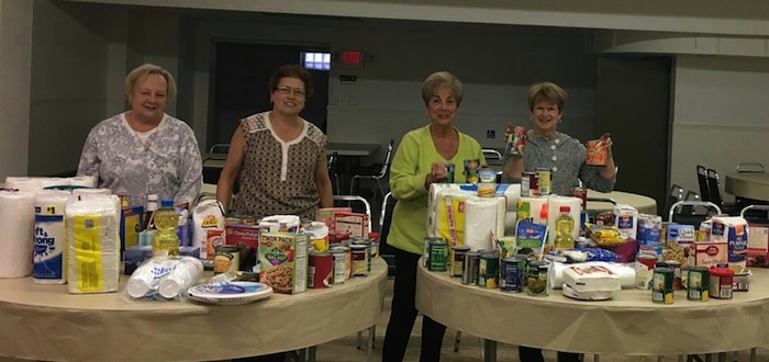 Members of the Blessed Mother Society of Our Lady of Mount Carmel Church in Niles collected baking supplies, canned goods, paper supplies and turkeys for three area families for Thanksgiving. Above, from left, are Beth Patrone, Stephanie Preston, Geri Borgen and Susan Pappada.