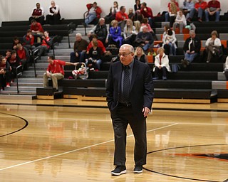 in the first quarter ofin the first quarter ofColumbiana head coach Ron Moschella walks onto the court before a high school basketball game against Mineral Ridge, Saturday, Dec. 9, 2017, in Mineral Ridge. Columbiana won 70-32...(Nikos Frazier | The Vindicator)