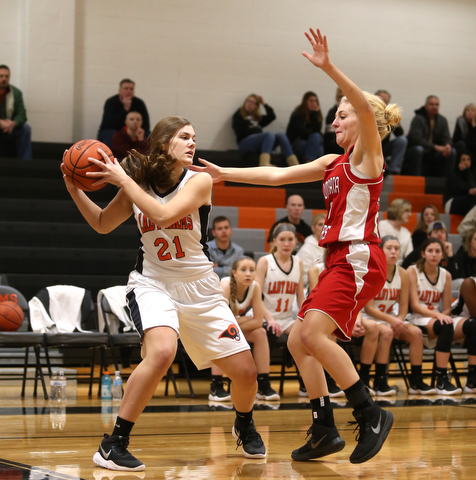 Columbiana's Alexis Cross (20) boxes out Mineral Ridge forward Noelle Bukovina (21) in the first quarter of a high school basketball game, Saturday, Dec. 9, 2017, in Mineral Ridge. Columbiana won 70-32...(Nikos Frazier | The Vindicator)