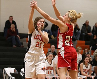Columbiana's Alexis Cross (20) boxes out Mineral Ridge forward Noelle Bukovina (21) in the first quarter of a high school basketball game, Saturday, Dec. 9, 2017, in Mineral Ridge. Columbiana won 70-32...(Nikos Frazier | The Vindicator)