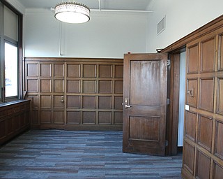     ROBERT K. YOSAY  | THE VINDICATOR..The original Vindicator building on the corner of Vindicator Square and Boardman St  has been renovated and opens for YBI..William J Brown office on the first floor of the building-30-