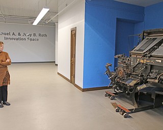     ROBERT K. YOSAY  | THE VINDICATOR..The original Vindicator building on the corner of Vindicator Square and Boardman St  has been renovated and opens for YBI...The first  floor formerly business and circulation now called innovation place- with two liinotype machines in an alcove ..-30-