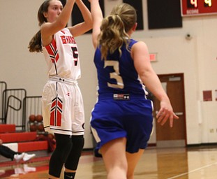 Girard's Sophie Griffith (5) goes up for three in the second quarter of an AAC high school basketball game, Monday, Dec. 11, 2017, in Girard. Girard won 39-23...(Nikos Frazier | The Vindicator)