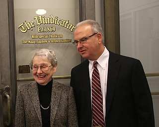Mrs. Jagnow and Mark Brown look at the old Vindicator doors at the grand opening of the new Youngstown Business Incubator building, Monday, Dec. 11, 2017, in Youngstown...(Nikos Frazier | The Vindicator)