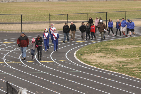   ROBERT K YOSAY  | THE VINDICATOR...  Lordstown Veterans Memorial Stadium dedication.: Lordstown HS new track and soccer field. . Honoring Doug Wise  his family - Mark Wise - Melissa Oakman Riley --and rest of the school took  the first lap.. Doug was custodian at the school and recently died...-30-