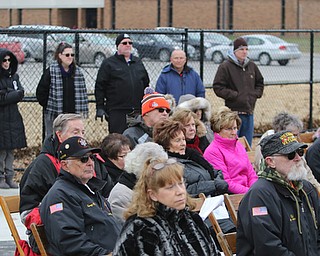   ROBERT K YOSAY  | THE VINDICATOR..the crowd listens to the ceremony.  Lordstown Veterans Memorial Stadium dedication.: Lordstown HS new track and soccer field. ..-30-