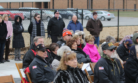   ROBERT K YOSAY  | THE VINDICATOR..the crowd listens to the ceremony.  Lordstown Veterans Memorial Stadium dedication.: Lordstown HS new track and soccer field. ..-30-
