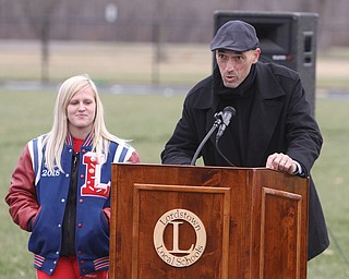   ROBERT K YOSAY  | THE VINDICATOR..Soccer coach Coach Matt Kresic.   and Senior Corine Eastham..  thank everyone... for their supper..  Lordstown Veterans Memorial Stadium dedication.: Lordstown HS new track and soccer field. ..-30-