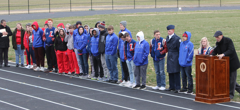   ROBERT K YOSAY  | THE VINDICATOR..Soccer coach Coach Matt Kresic.   and Senior Corine Eastham..  thank everyone... for their supper..  Lordstown Veterans Memorial Stadium dedication.: Lordstown HS new track and soccer field. ..-30-