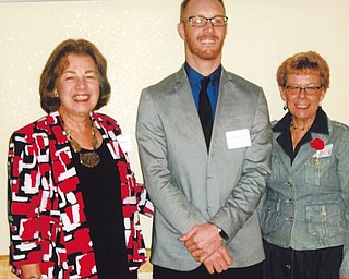 Mahoning Retired Teachers Association gathered recently at The Georgetown in Boardman to award a $2,000 scholarship to John Rozum, an integrated language arts major at Youngstown State University. Eligible recipients are required to have a minimum 3.0 GPA and be enrolled as a full time student. Rozum is pursuing teaching English as a second language. Above, from left, are Sonia Tsvetkoff, MRTA scholarship chairwoman; Rozum; and Susan Harris, MRTA president.
