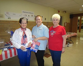  Above, from left, Girard Junior Women Colette Chuey, Connie Schultz and Margaret Pitts volunteered at a recent performance by the Girard Community Swing Band. The club is raising money to donate to community projects such as the food distribution center at Emmanuel Center. Below are Dorothy Robinson, left, and Sylvia Holmes, league members who served as hostesses at a bake sale during the concert.
