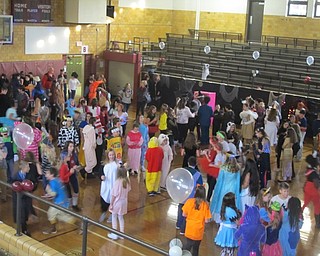 Neighbors | Zack Shively.Students danced in the Center Intermediate School gymnasium for the school's fall festival on Oct. 26. The PTA organized the event for the students to give them a safe opportunity to experience Halloween.