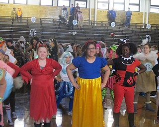 Neighbors | Zack Shively.Students did the "Macarena" during their fall festival at Center Intermediate. They had a dance party and pizza party, as well as costume contest and selfie station.