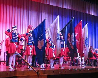 Neighbors | Zack Shively.Austintown symphonic band and choir played “Armed Forces - The Pride of America“ together. The song combined the anthems of the armed forces. The veterans at the assembly stood when the song of their military branch played.