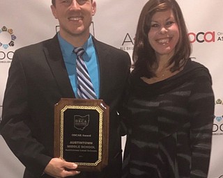 Neighbors | Submitted .Heidi Martin and Jarod Thomas accepted the Ohio School Counselor Accountability Report for Austintown Middle School.