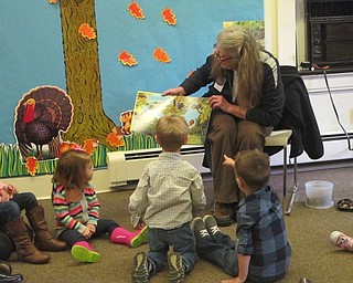 Neighbors | Zack Shively.The Ford Nature Center hosted a Tales for Tots program for young children on Nov. 17. The program focused on acorns. Pictured, Marilyn Williams read a story to the children about acorns.