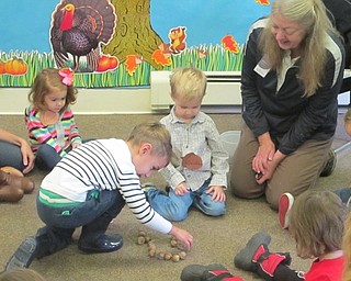 Neighbors | Zack Shively.Marilyn Williams used the acorns to help the children work on their math skills. She had the children count the number of acorns aloud. They played a game where the children subtracted one acorn from their pile throughout a story.