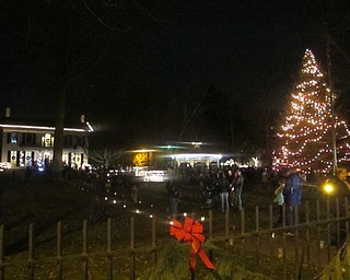Neighbors | Zack Shively.Mayor Timothy Sicafuse started a countdown around 7 p.m. for the Poland swim team to light the tree. The mayor also thanked the Poland Junior Women's Club for organizing the event.