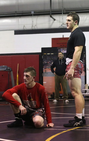 Tyler Stein works out with David Reinhart during a regular season practice, Wednesday, Dec. 13, 2017, at Canfield High school in Canfield...(Nikos Frazier | The Vindicator)
